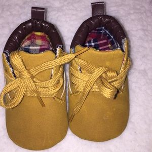 Tan baby boots with laces